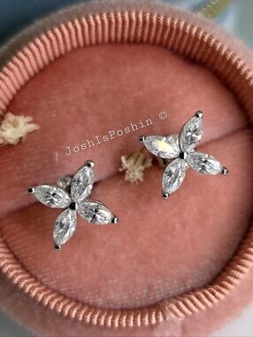 Moissanite Flower Stud Earrings In Sterling Silver